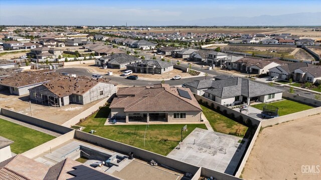 bird's eye view featuring a mountain view and a residential view