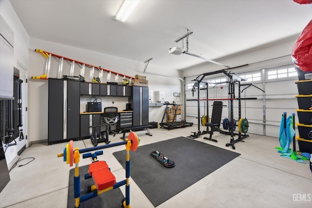workout area with a garage