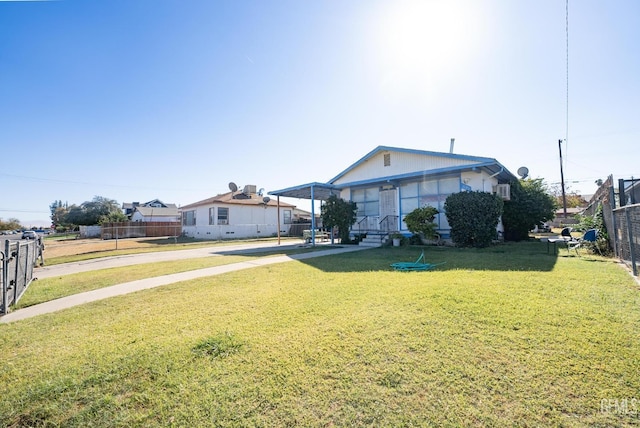 bungalow-style home featuring a front lawn