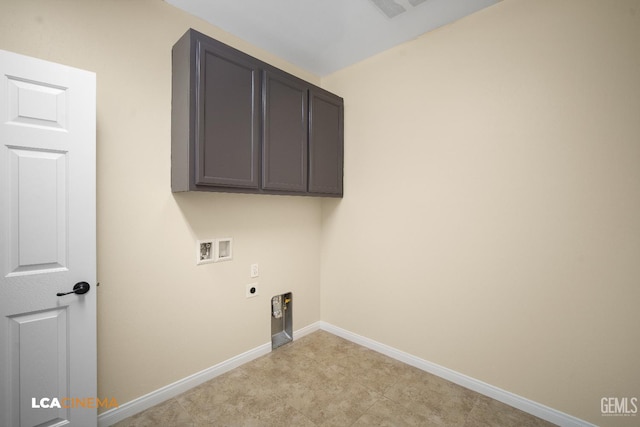 917 Newcastle Ct, Shafter, CA 93263 - laundry room with hookup for an electric dryer, hookup for a washing machine, baseboards, and cabinet space