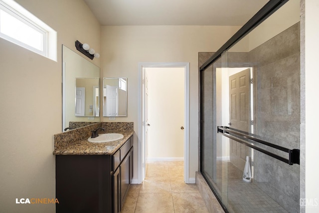 917 Newcastle Ct, Shafter, CA 93263 - full bathroom with vanity, a stall shower, and tile patterned floors