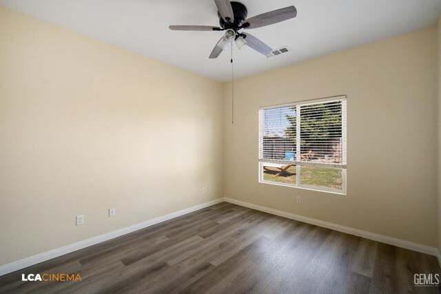 917 Newcastle Ct, Shafter, CA 93263 - unfurnished room featuring dark wood-type flooring, baseboards, and a ceiling fan