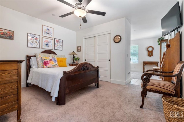 10026 Murfreesboro Dr, Bakersfield, CA 93311 - bedroom featuring light colored carpet, a closet, and ceiling fan