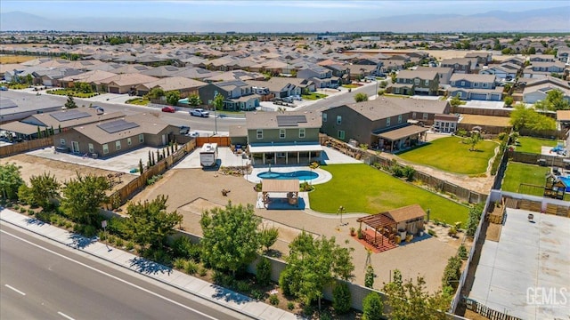10026 Murfreesboro Dr, Bakersfield, CA 93311 - aerial perspective of suburban area featuring a pool and mountains