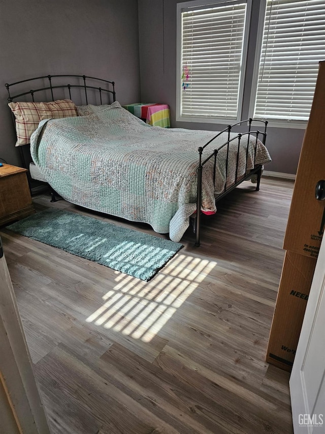 bedroom featuring hardwood / wood-style floors