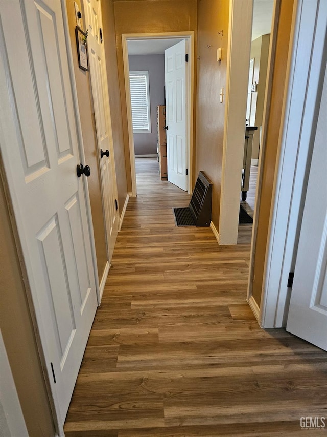 hall featuring wood-type flooring