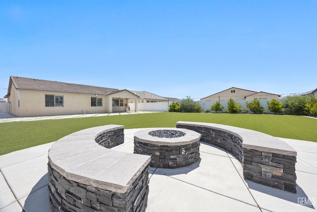 14610 Coyle Cir, Bakersfield, CA 93311 - fenced backyard featuring a fire pit and a patio