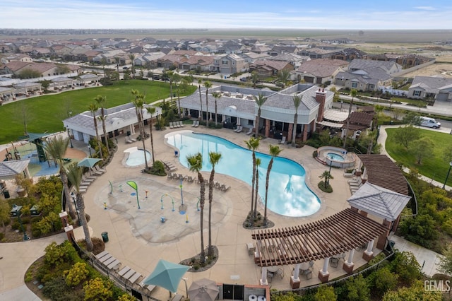 14610 Coyle Cir, Bakersfield, CA 93311 - community pool featuring a hot tub, a residential view, and a patio area