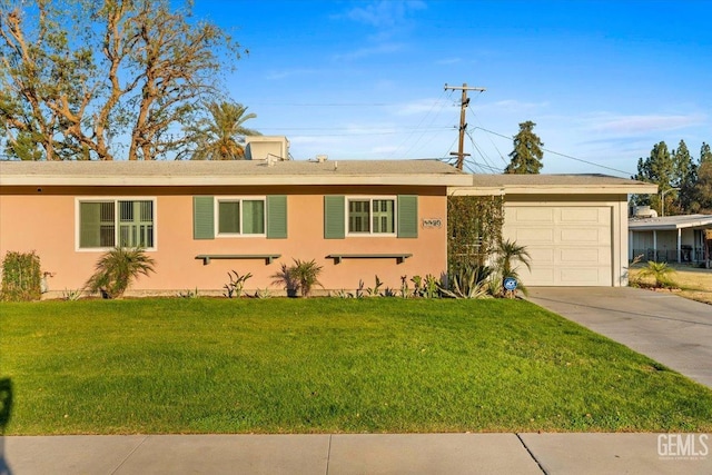 ranch-style house featuring a garage and a front yard