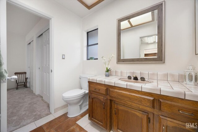 6801 Weldon Ave, Bakersfield, CA 93308 - bathroom featuring vanity and toilet