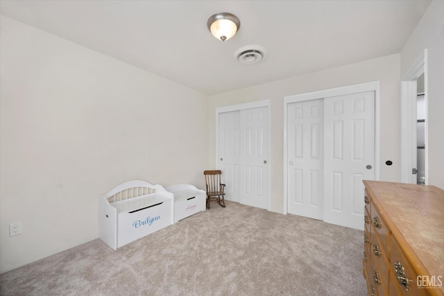 6801 Weldon Ave, Bakersfield, CA 93308 - unfurnished bedroom with two closets and carpet floors