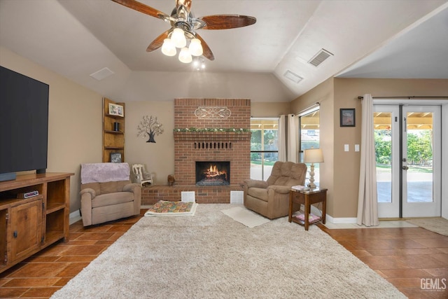 6801 Weldon Ave, Bakersfield, CA 93308 - living area featuring ceiling fan, a fireplace, baseboards, vaulted ceiling, and tile patterned floors