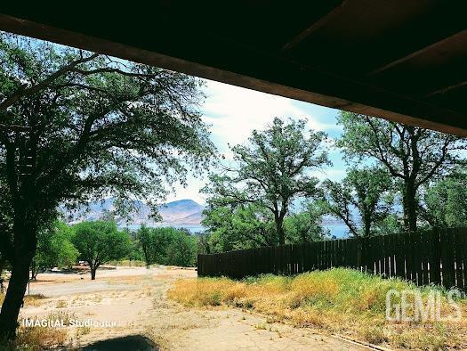 411 Old State Rd, Wofford Heights, CA 93285 - exterior space featuring fence and a mountain view
