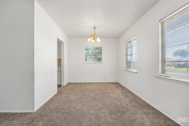 3201 Pomona St, Bakersfield, CA 93305 - carpeted spare room featuring a chandelier