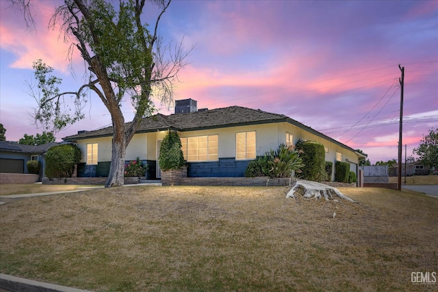 3201 Pomona St, Bakersfield, CA 93305 - ranch-style house with stucco siding and a front yard