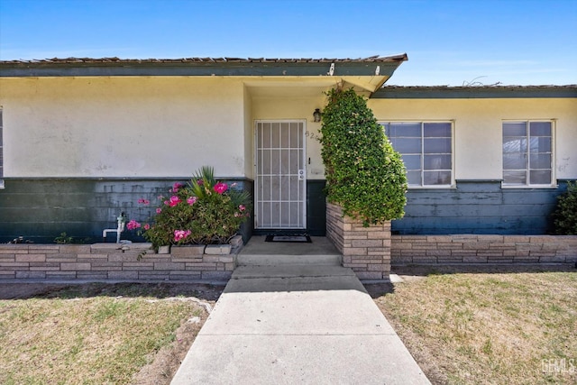 3201 Pomona St, Bakersfield, CA 93305 - doorway to property with stucco siding