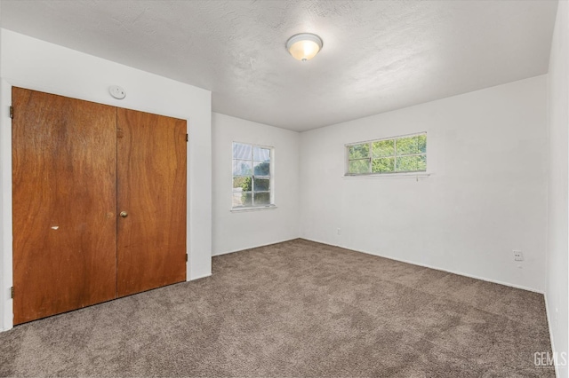 3201 Pomona St, Bakersfield, CA 93305 - unfurnished bedroom featuring carpet floors and a closet