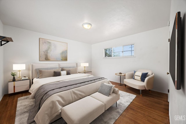 3201 Pomona St, Bakersfield, CA 93305 - bedroom featuring dark wood-type flooring