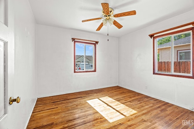 102 Wetherley Dr, Bakersfield, CA 93309 - unfurnished room featuring wood finished floors, baseboards, and a ceiling fan