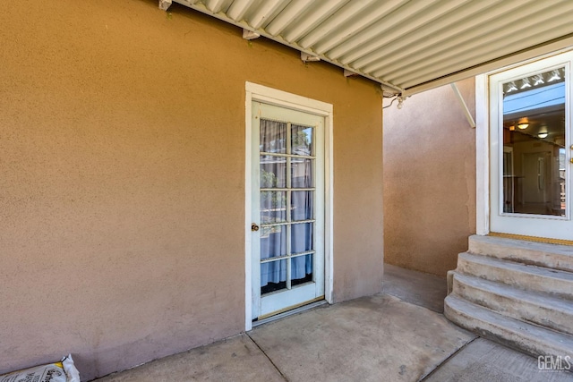102 Wetherley Dr, Bakersfield, CA 93309 - entrance to property with stucco siding and a patio area