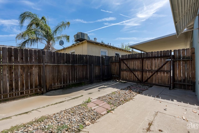 102 Wetherley Dr, Bakersfield, CA 93309 - view of patio with a gate and central air condition unit
