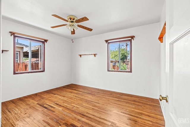 102 Wetherley Dr, Bakersfield, CA 93309 - empty room with a ceiling fan and wood finished floors