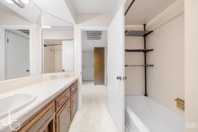 full bath with vanity, visible vents, and bathing tub / shower combination