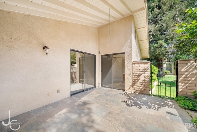 view of patio / terrace featuring a gate