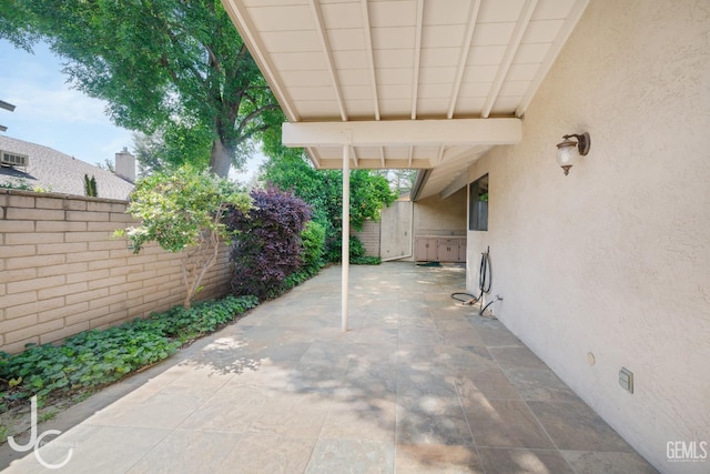 view of patio / terrace with fence