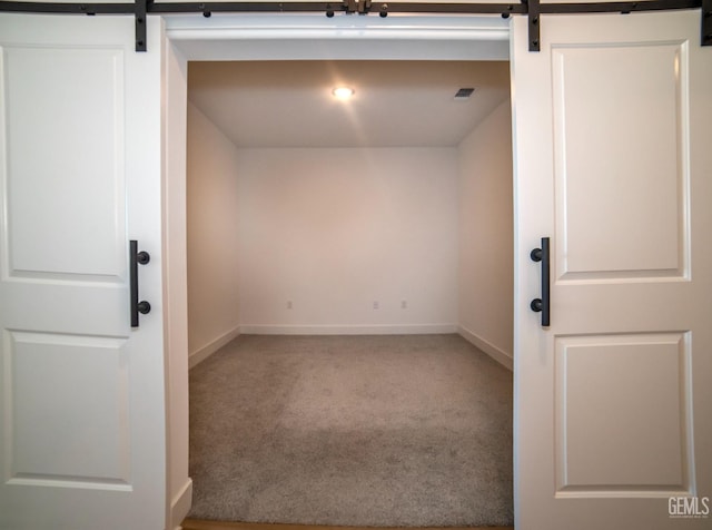 interior space with a barn door