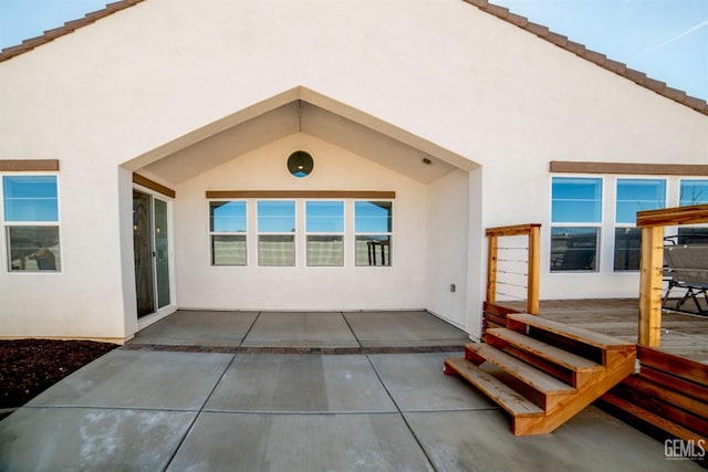 back of house with a patio