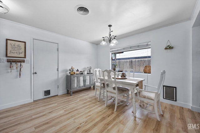 5906 Ronald Way, Bakersfield, CA 93308 - dining space featuring light wood-type flooring and a chandelier