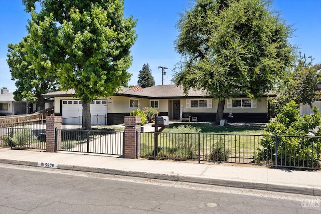 5906 Ronald Way, Bakersfield, CA 93308 - single story home with a garage, a fenced front yard, and driveway