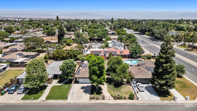 5906 Ronald Way, Bakersfield, CA 93308 - aerial view of residential area with a mountain backdrop and a pool area
