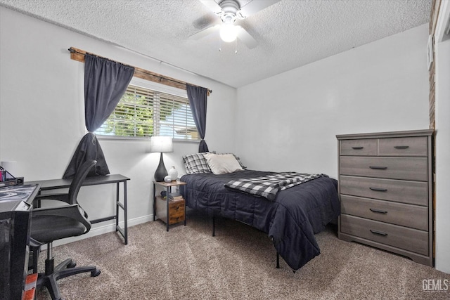 5906 Ronald Way, Bakersfield, CA 93308 - carpeted bedroom with a textured ceiling, a desk, and ceiling fan