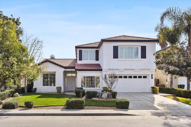 mediterranean / spanish-style home featuring a garage and a front lawn