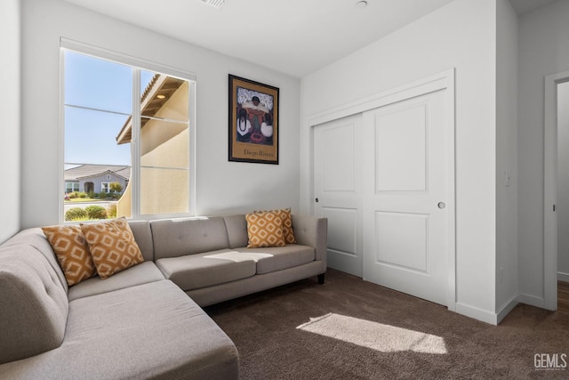 713 Winooski Ct, Bakersfield, CA 93314 - carpeted living area featuring baseboards