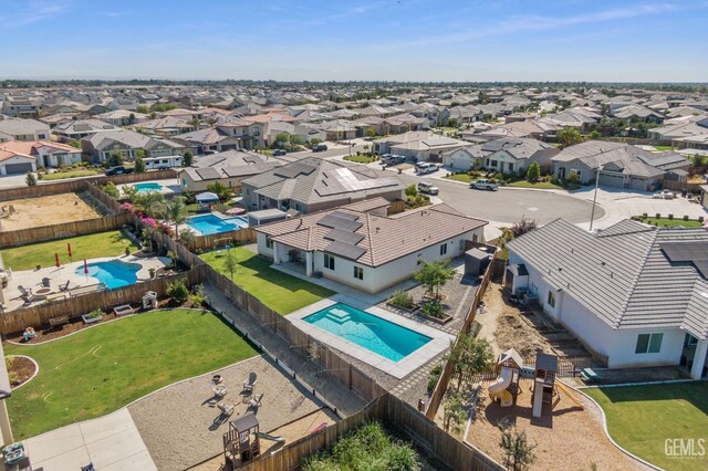 713 Winooski Ct, Bakersfield, CA 93314 - aerial perspective of suburban area featuring a pool area