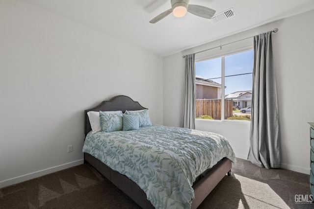 713 Winooski Ct, Bakersfield, CA 93314 - carpeted bedroom with baseboards and ceiling fan