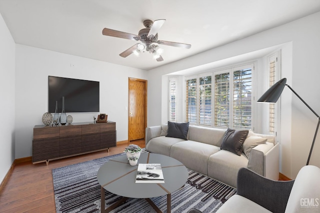 631 Faversham Way, Bakersfield, CA 93311 - living area with wood finished floors, baseboards, and a ceiling fan