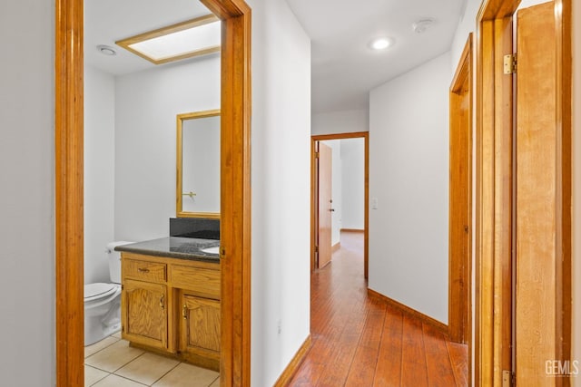 631 Faversham Way, Bakersfield, CA 93311 - hallway featuring light wood finished floors and baseboards