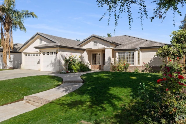 631 Faversham Way, Bakersfield, CA 93311 - ranch-style home featuring brick siding, a front lawn, an attached garage, concrete driveway, and stucco siding