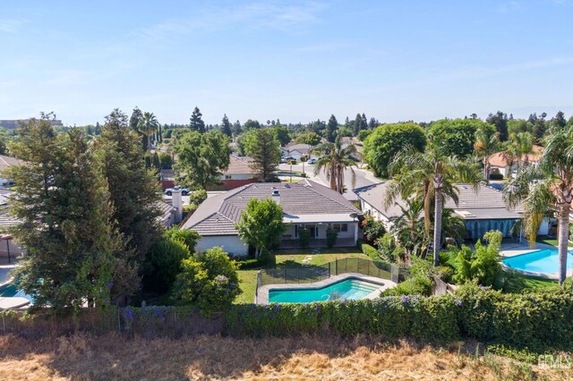 631 Faversham Way, Bakersfield, CA 93311 - aerial perspective of suburban area with a pool
