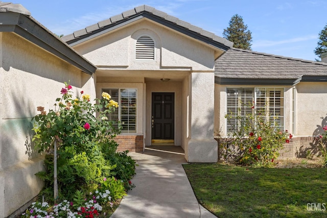 631 Faversham Way, Bakersfield, CA 93311 - doorway to property with stucco siding and brick siding