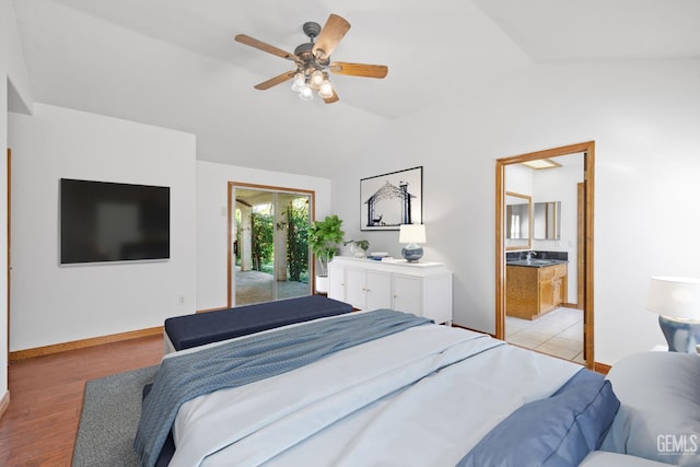 631 Faversham Way, Bakersfield, CA 93311 - bedroom featuring access to exterior, lofted ceiling, light wood finished floors, a ceiling fan, and ensuite bathroom