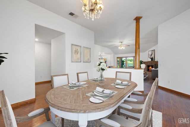 631 Faversham Way, Bakersfield, CA 93311 - dining area with wood-type flooring, baseboards, a brick fireplace, decorative columns, and vaulted ceiling