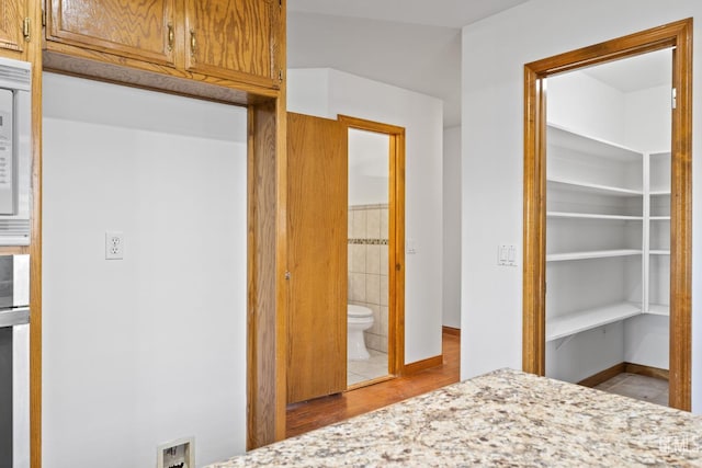 631 Faversham Way, Bakersfield, CA 93311 - unfurnished bedroom with tile patterned flooring, a closet, and ensuite bath