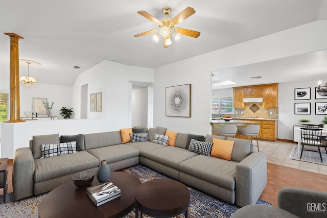 631 Faversham Way, Bakersfield, CA 93311 - living area with a chandelier, ceiling fan, lofted ceiling, and light tile patterned flooring