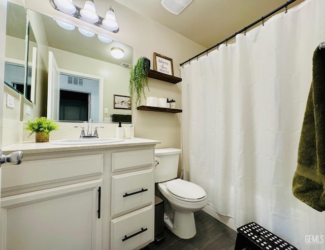 7303 Wild Mustang Dr, Bakersfield, CA 93311 - bathroom with wood finished floors, vanity, and a shower with curtain