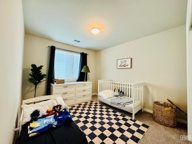 7303 Wild Mustang Dr, Bakersfield, CA 93311 - carpeted bedroom featuring baseboards and a nursery area